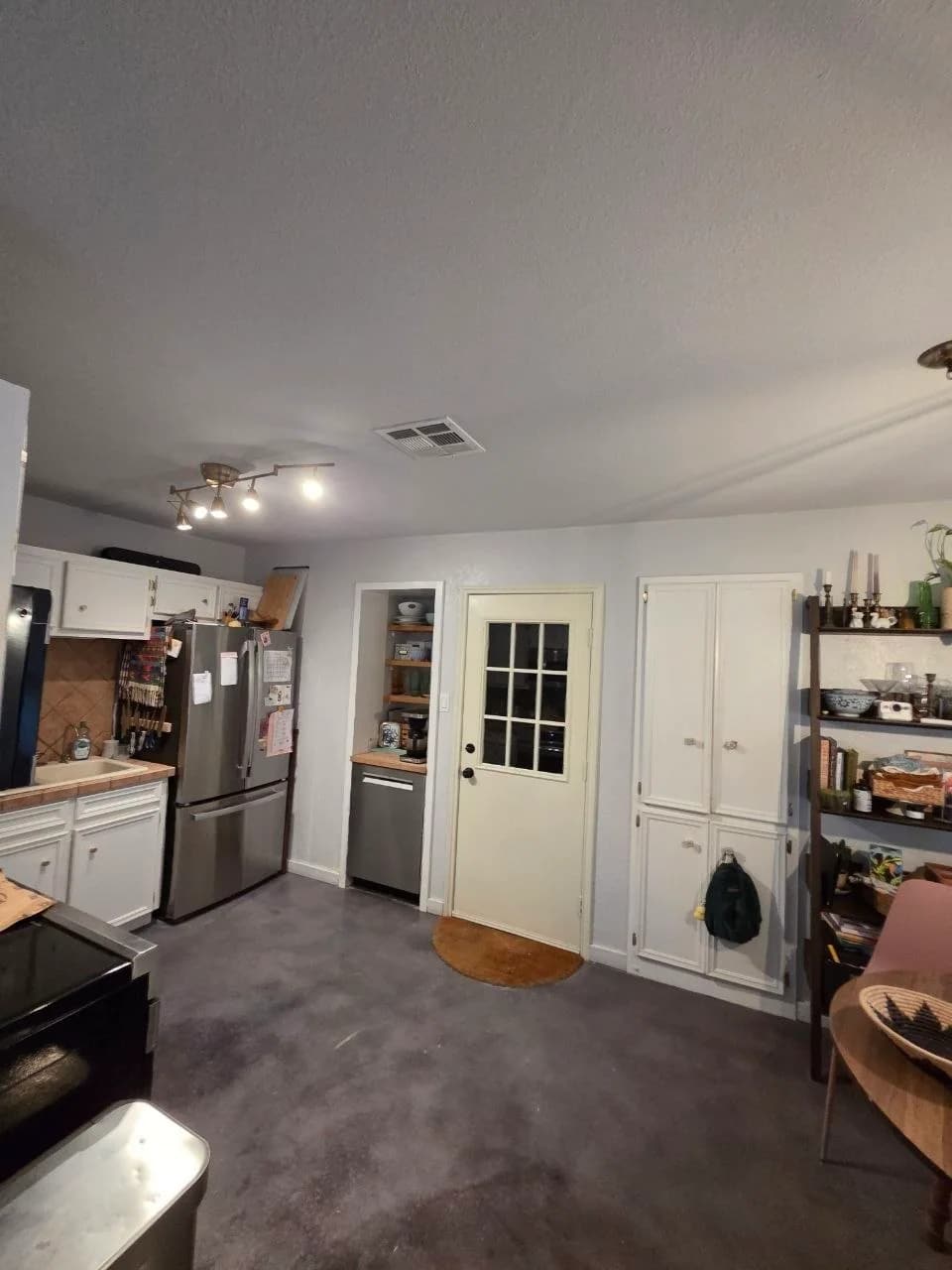 Smooth painted kitchen ceiling after popcorn ceiling removal