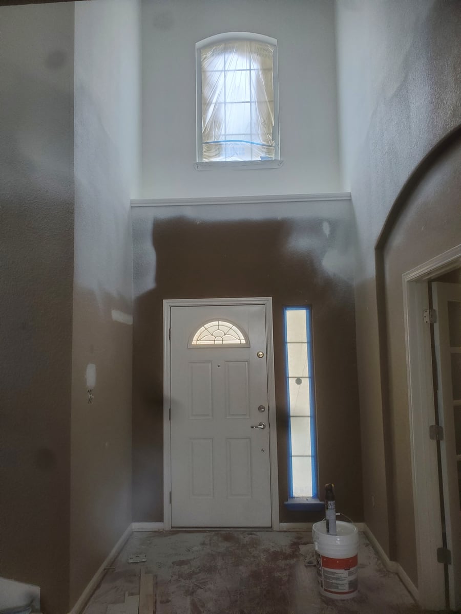 Interior entryway prepared for painting in an Austin area home