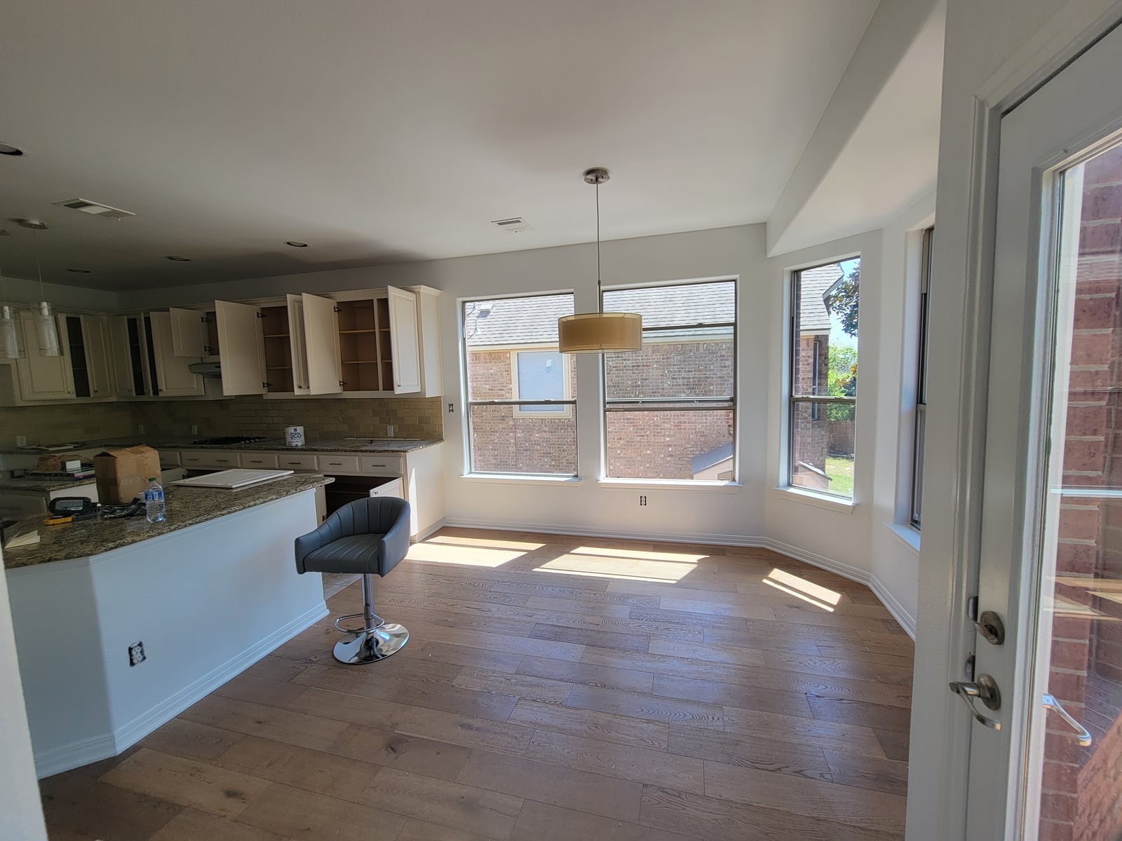 Finished painted kitchen walls and cabinets in an Austin area home