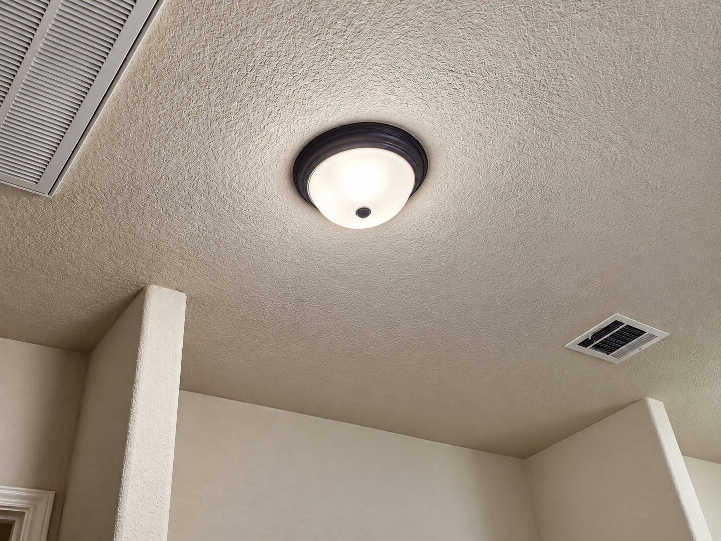 Finished textured drywall ceiling after repair in an Austin home