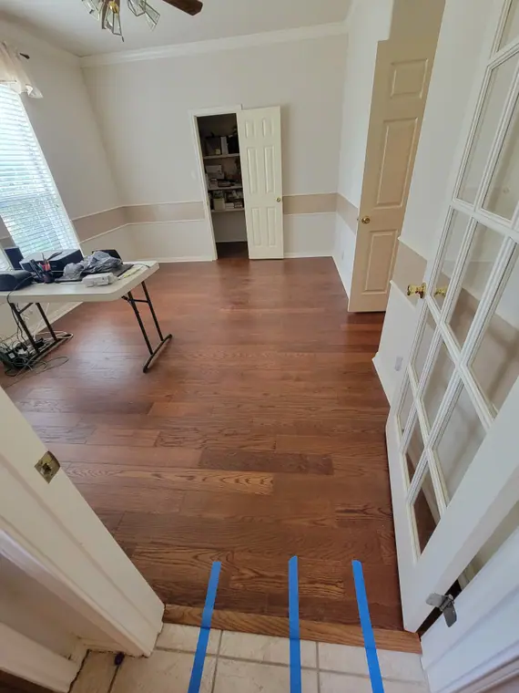 Finished wood flooring installation in an Austin area room