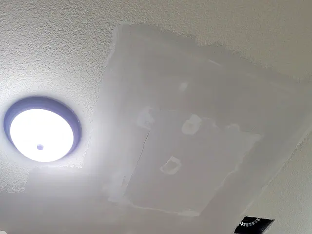 Ceiling Repair and Texture Match — in progress stage