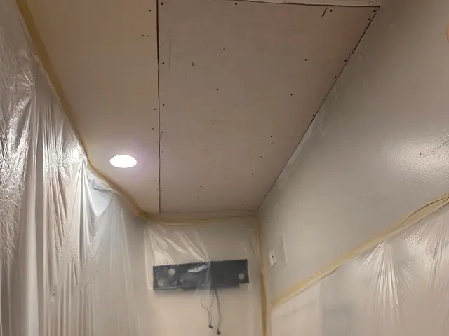 AC Water-Damage Ceiling Repair — in progress stage