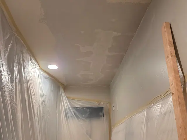 AC Water-Damage Ceiling Repair — in progress stage