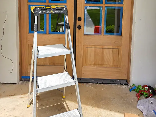 Entry Door and Stair Finish — in progress stage